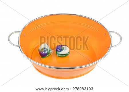 Basin For Different Purposes And Washing Gel Capsule Isolated On White Background
