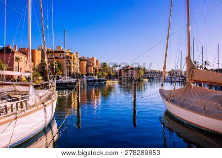 Port Of Sotogrande. Port, Sea, Yachts And Colorful Houses. Sotogrande, Costa Del Sol, Andalusia, Spa
