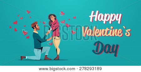 Man Kneeling Holding Engagement Ring Proposing To Woman Marry Him Happy Valentines Day Concept Young