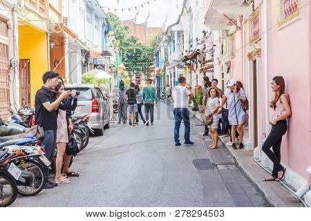 Phuket, Thailand - 2nd September 2018: Chinese Tourists Taking Photos On Soi Rommanee. Many Chinese 