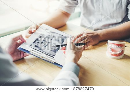 Dentist Learning How To Brush Teeth Concept