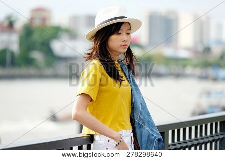 Young Asian Woman Portrait At City Outdoors Background, Casual Lifesyle, Travel Blogger