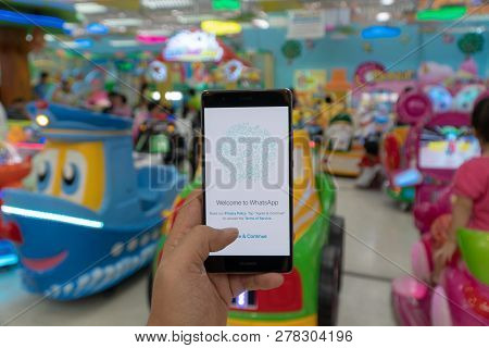 Chiang Mai, Thailand - Jan. 06,2019: Man Holding Oneplus 6 With Whatsapp Messenger On The Screen.wha