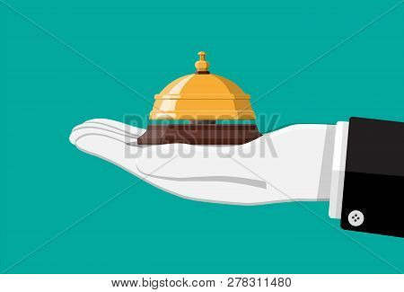 Golden Service Bell In Hand. Help, Alarm And Support Concept. Hotel, Hospital, Reception, Lobby And 