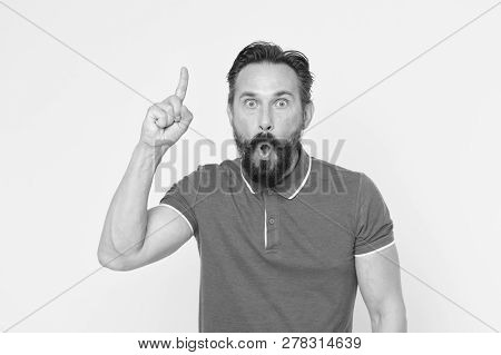 Surprised Man With Open Mouth Keep Finger Pointing Up. Beraded Man Surprised With Epiphany And Sudde