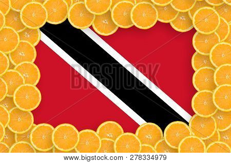 Trinidad And Tobago Flag  In Fresh Citrus Fruit Slices Frame