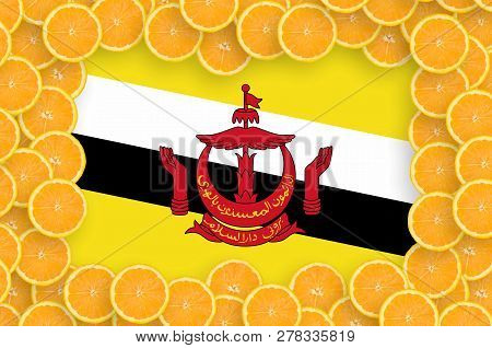 Brunei Darussalam Flag  In Fresh Citrus Fruit Slices Frame