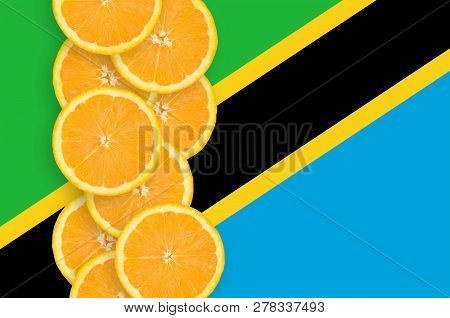 Tanzania Flag And Citrus Fruit Slices Vertical Row