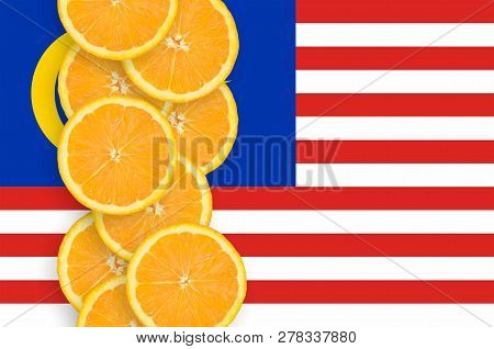 Malaysia Flag And Citrus Fruit Slices Vertical Row