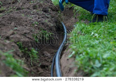 Excavated Earth Trench For Pipe-laying Of Communication And Electrical Wiring Under The Ground To Pr