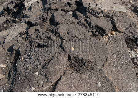 A Pile Of Broken Asphalt Background Texture.