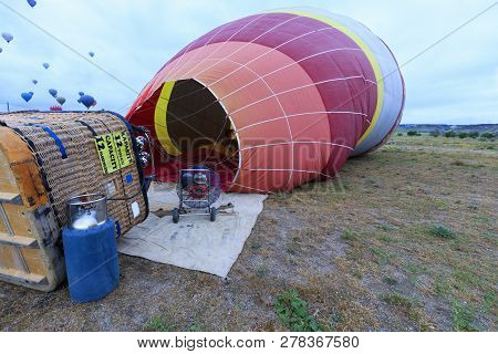 People Inflate Balloons With A Gas Torch And A Large-capacity Gasoline Industrial Fan By Tilting The