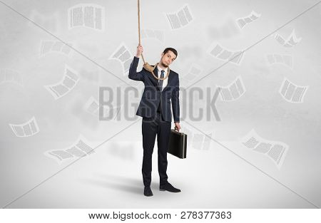 Young burnout businessman with flying documents concept