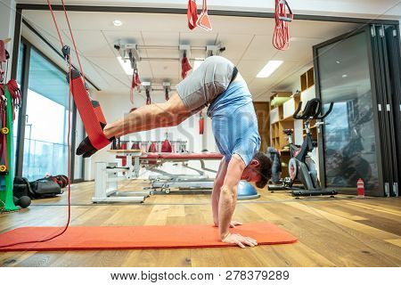 Person Works In A Well Equipped Gym, Proprioceptive Training, Core Stability, Injury Prevention