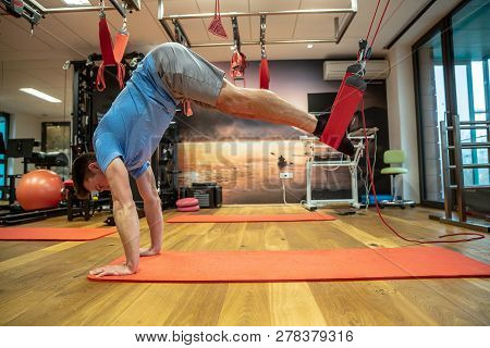 Person Works In A Well Equipped Gym, Proprioceptive Training, Core Stability, Injury Prevention