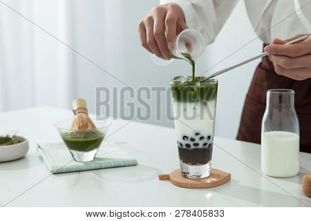 A Pretty Girl Is Making Maccha Brown Sugar Milk