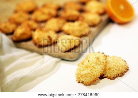Coconut Bisquits On A Wooden Dish And White Background