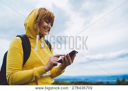 Woman Holding In Female Hands Gadget Technology, Tourist Young Girl On Backgroundblu Sky Using Mobil