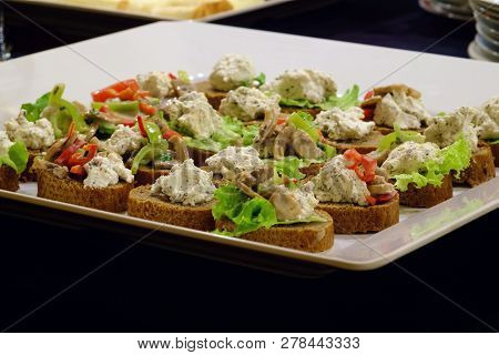 Small Sandwiches On The White Plate, Black Surface