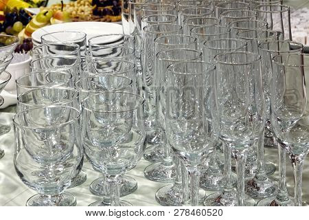 A Mixed Wine Glasses, Fruits On Background