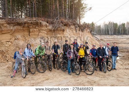 Tyumen, Russia - April 22, 2007: First Festival Of Cyclists Samogon. Participants Pose On Sandpit