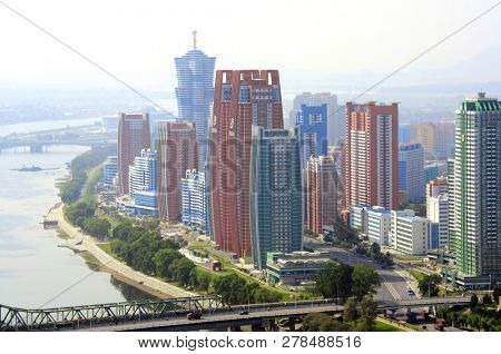 NORTH KOREA, PYONGYANG - SEPTEMBER 25, 2017: Aerial view of new residential complex and Daedong River (Taedong River), capital city of North Korea (DPRK). View from Yanggakdo island