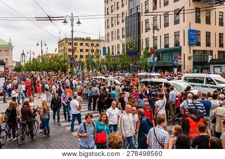 Vilnius, Lithuania - July 27, 2013: Pride Parade In Action. Crowd Of Watchers And Demonstrators With