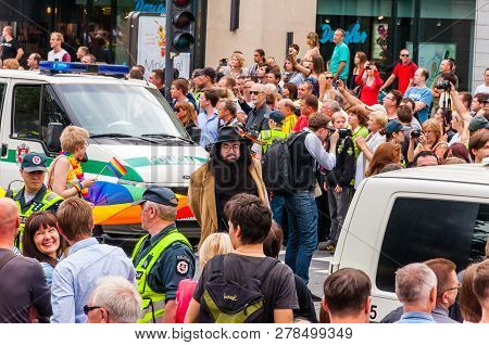 Vilnius, Lithuania - July 27, 2013: Police Cars Driving During The Pride Parade On Gedimino Street F