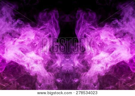 Pink Cloud Of Smoke Of  Black Isolated Background In The Form Of A Skull, Monster, Dragon On A Black