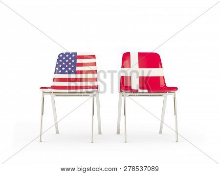 Two Chairs With Flags Of Us And Denmark Isolated On White