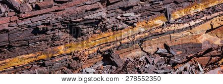 Hematite Ore Destroyed By Climatic Conditions. Banner For Design.