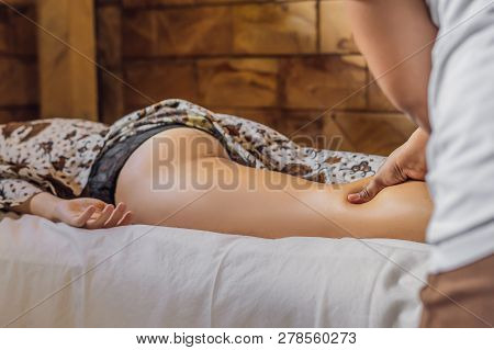 Total Relaxation. Beautiful Young Wwoman Get Balinese Or Thai Massage