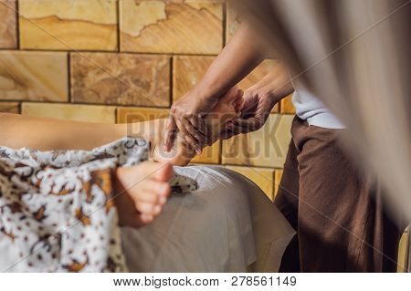 Total Relaxation. Beautiful Young Wwoman Get Balinese Or Thai Massage