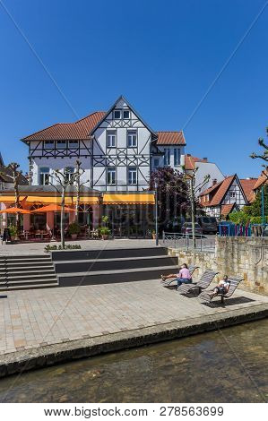 Bad Salzuflen, Germany - May 07, 2018: People On Sunbeds At The Canal In Bad Salzuflen, Germany