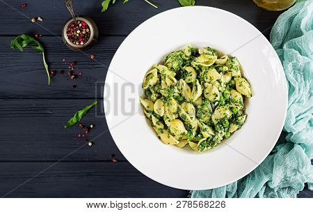 Conchiglie Pasta With Spinach And Green Pea Pesto. Italian Cuisine. Vegan Food. Top View