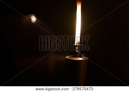 Fakel With Nice Warm Flame At Night And In The Background With A Nice Bokeh