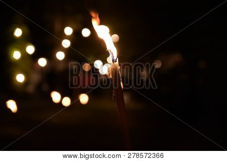 Fakel With Nice Warm Flame At Night And In The Background With A Nice Bokeh