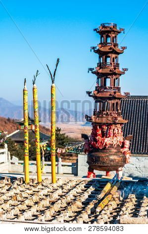 Tumen, China - December 31, 2018: The Censer With Is A Burning Joss Aroma Incense Sticks Or Candles 