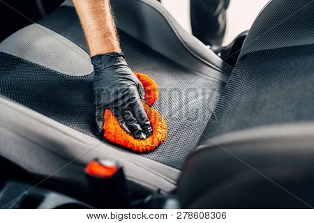 Chemical cleaning of car seats with spoonge