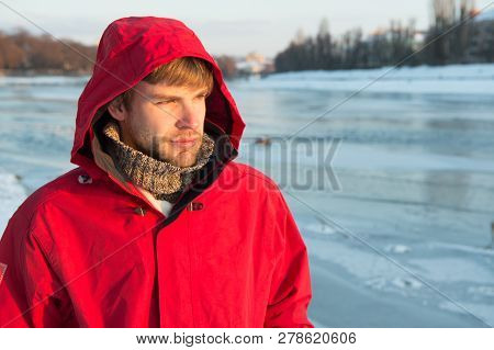 Man Bearded Stand Warm Jacket Snowy Nature Background. Wind Resistant Clothes. Winter Menswear. Clot