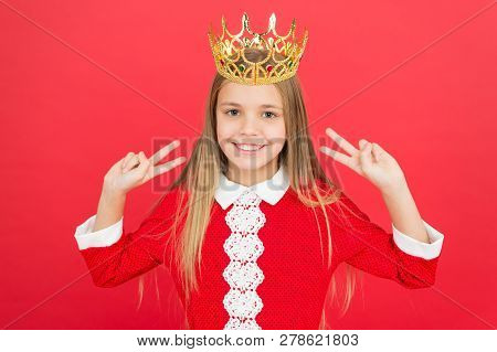 Childhood Happiness. Happy Little Girl On Red Background. Small Girl Child. School Education. Family