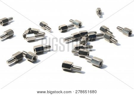 Several Motherboard Standoffs On White Background. Isolated.