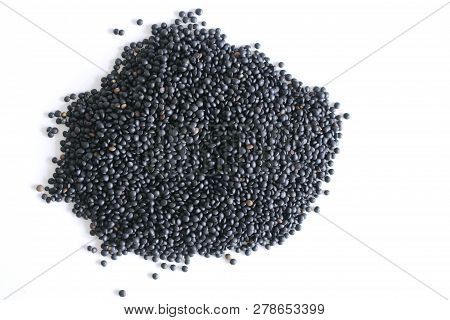 Lentil Beluga. Black Lentils.isolated On The White Background. Just Like The Red Lens, It Does Not N
