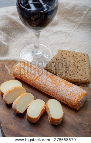 Fagotin Cheese With  Orange Coloured Rind Made From Cow Milk In Caves Of Maredsous Abbey, Belgium
