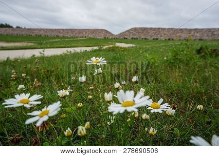 Scenery Of Stones And Meadow In Koknese In The Park Garden Of Destinies In Latvia. Garden Of Destini