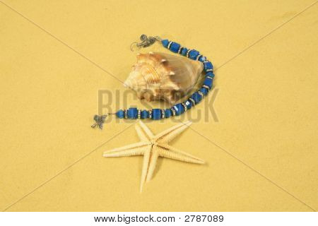 Mušle, Starfish & šperky v písku