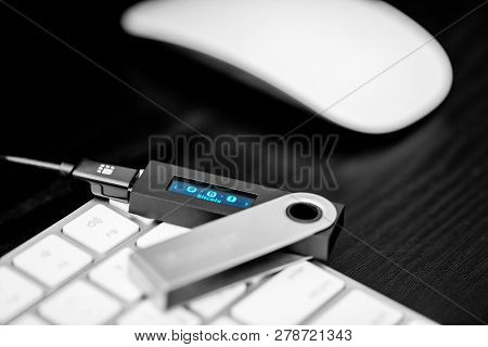 UKRAINE, ROVNO - ON JANUARY 11: Ledger hardware wallet for cryptocurrency on a white keyboard