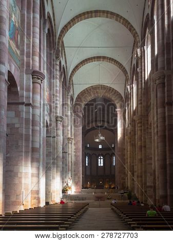 Speyer, Germany - August 17, 2017: Interior Of Speyer Cathedral With Its Nave And Altar. It Is The L