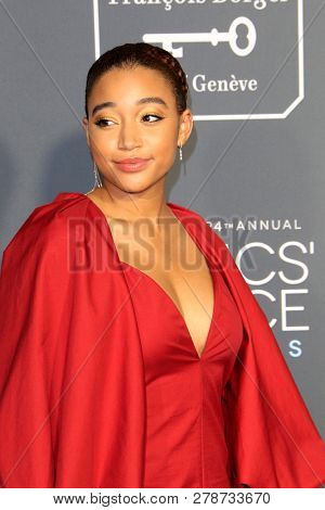 LOS ANGELES - JAN 13:  Amandla Stenberg at the Critics Choice Awards  at the Barker Hanger on January 13, 2019 in Santa Monica, CA