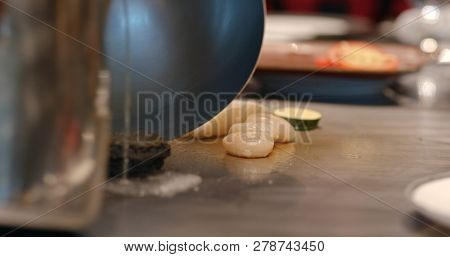 Cooking Teppanyaki in restaurant with Abalone 